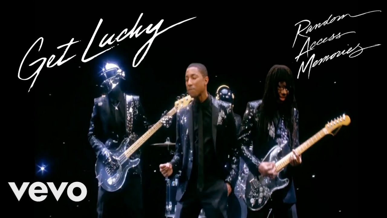 Daft Punk helmets with Pharrell Williams