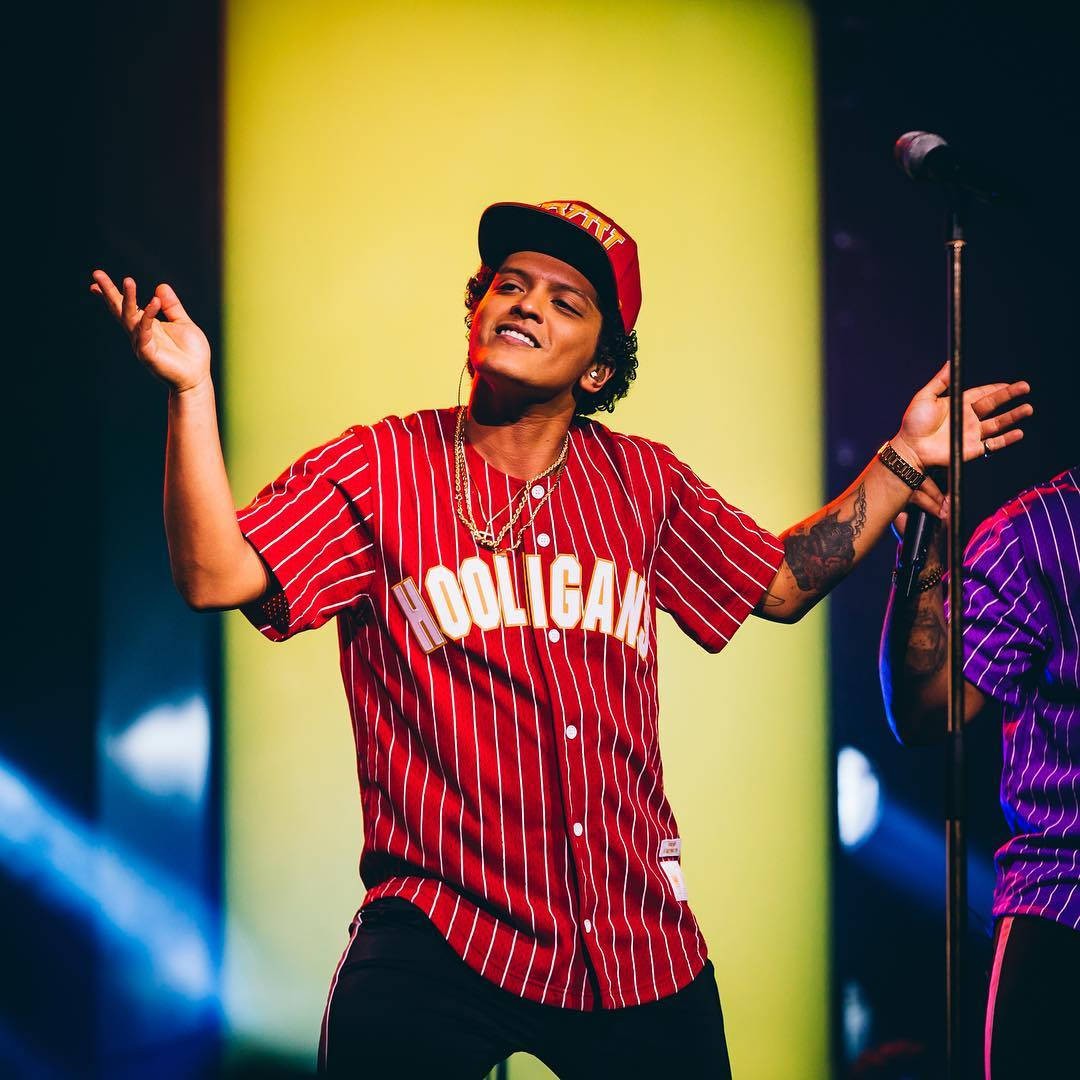 Bruno Mars and Lady Gaga performing together on stage