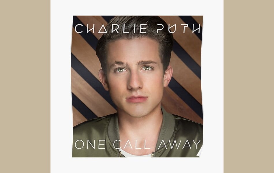 Charlie Puth performing with piano and keyboard setup